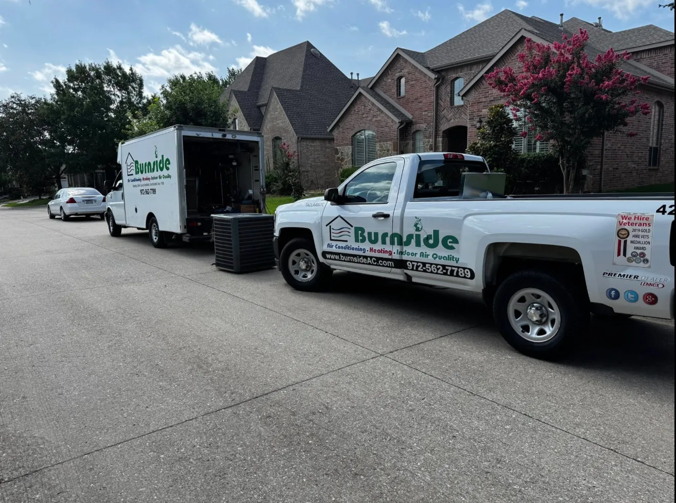Newly installed AC condensers in a residential side yard