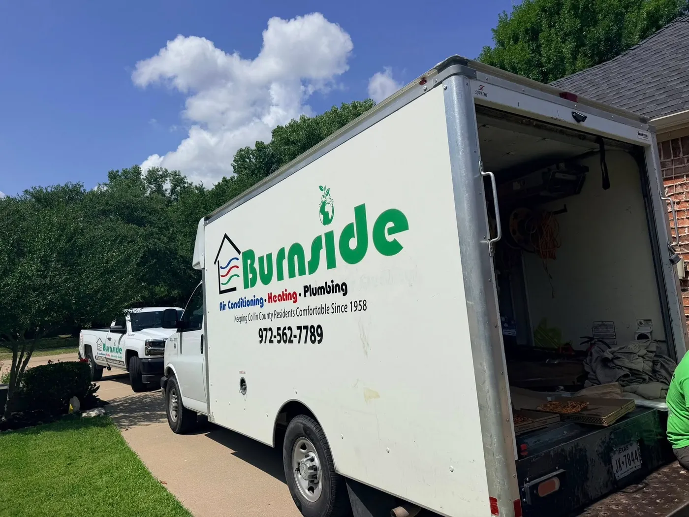 Branded Burnside service van on a job in McKinney